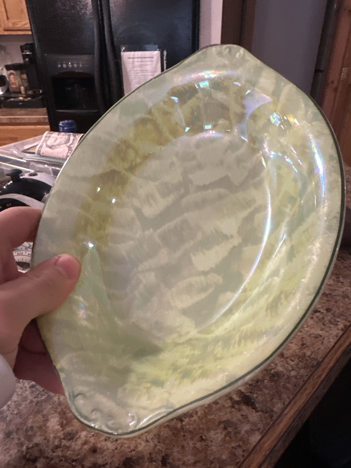 An ivory platter with a softly patterned glaze